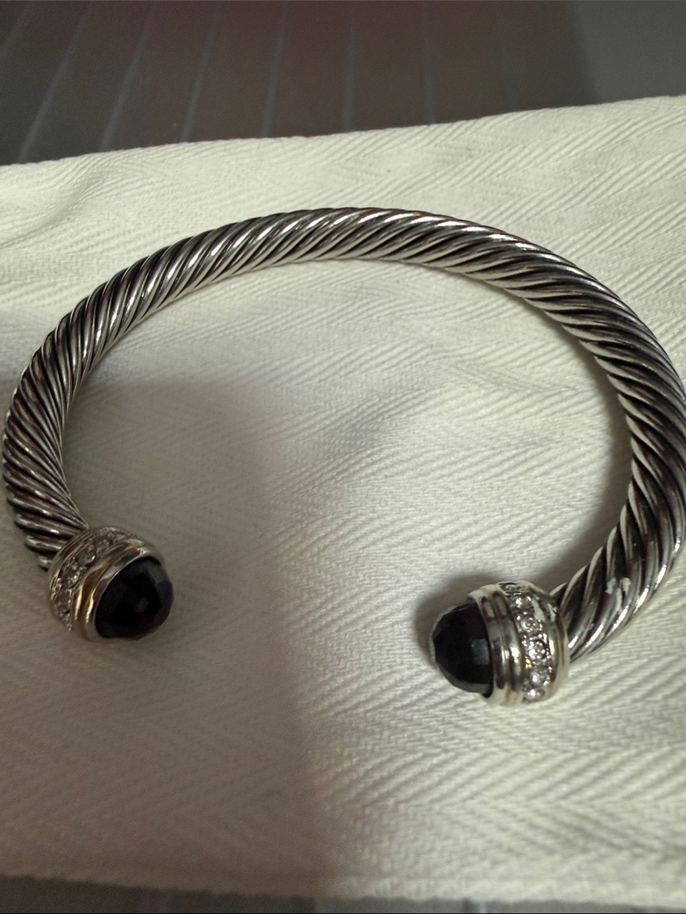 Classic Twisted Silver Cuff Bracelet with Black Onyx Ends